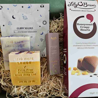 eye mask, soaps, bottle of calm and chocolates gift boxes